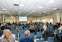 Participants listen to a lecture