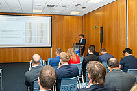 Participants listen to a lecture